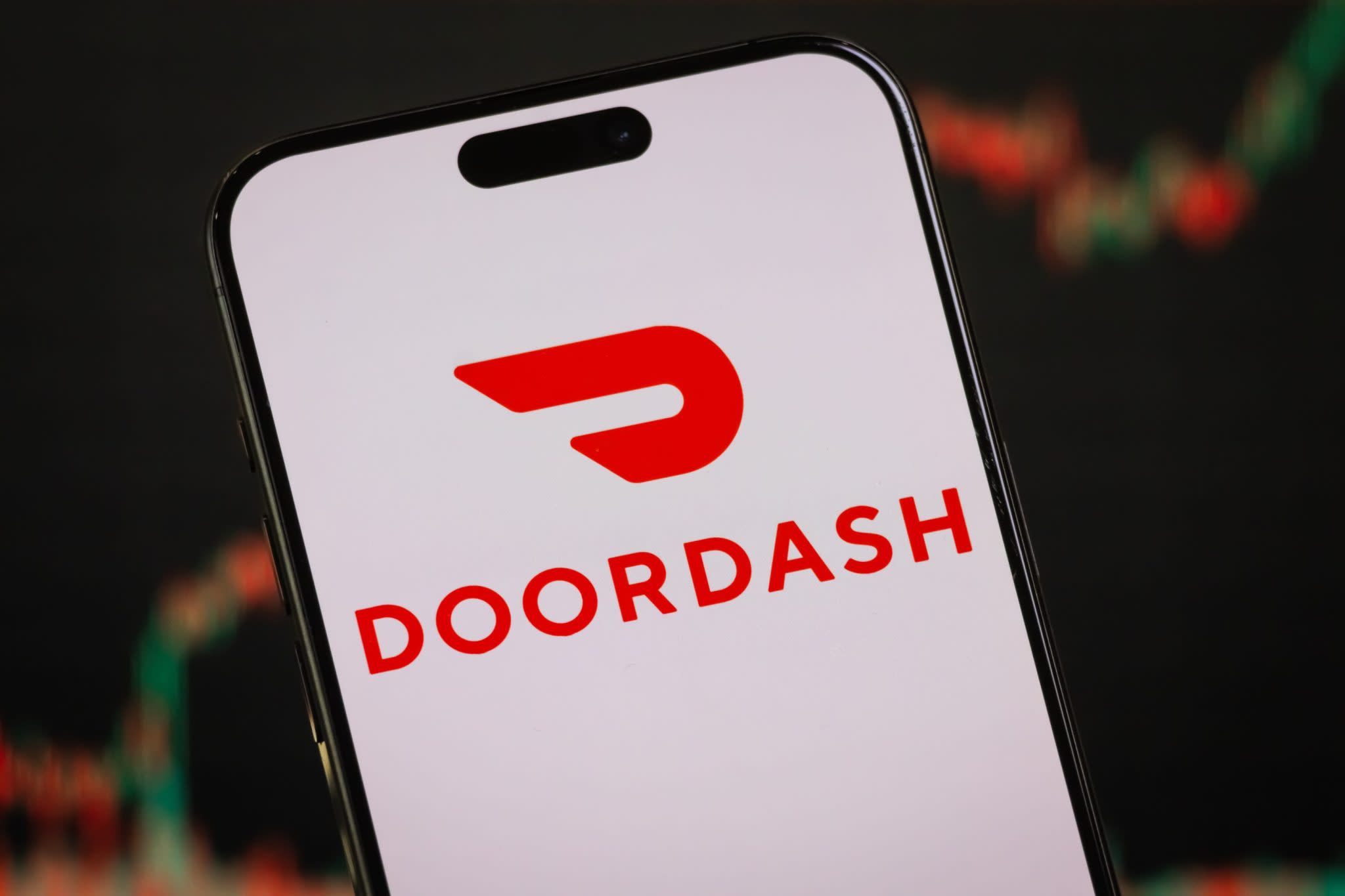DoorDash logo shown on a phone screen